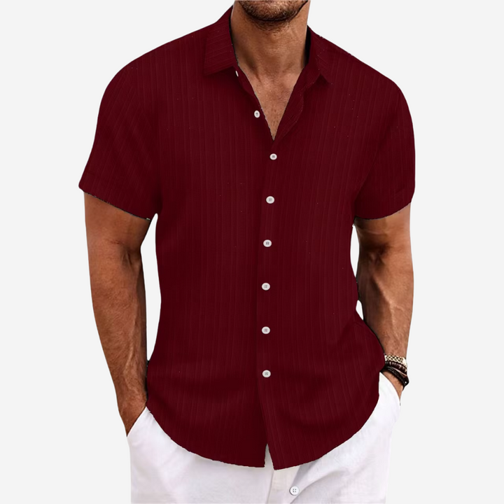 Stay cool in this men's breathable summer button-down shirt, short sleeve, lightweight, relaxed fit.