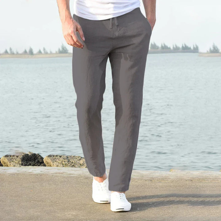 Lightweight men's casual trousers with adjustable drawstring waist, ideal for versatile everyday wear.