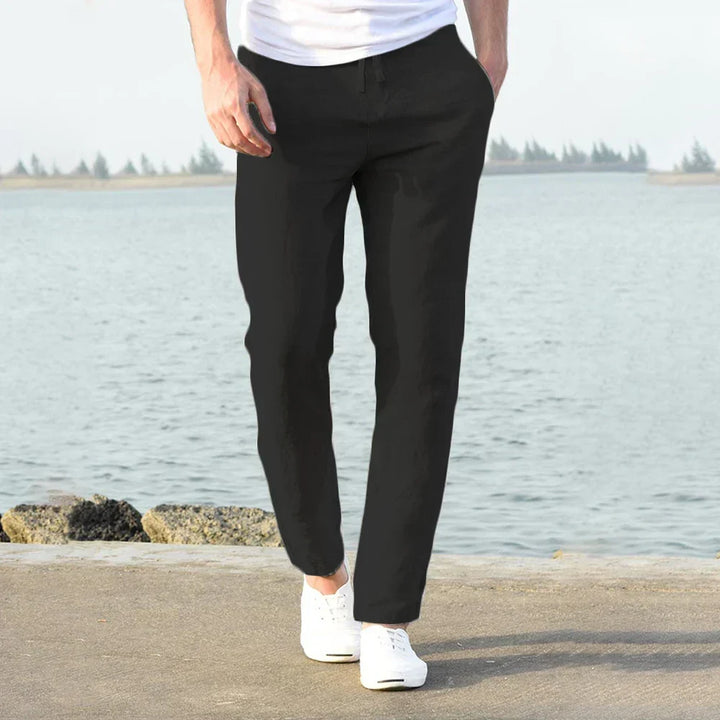 Stylish men's summer trousers, lightweight & comfortable with a modern drawstring design for relaxed fashion.