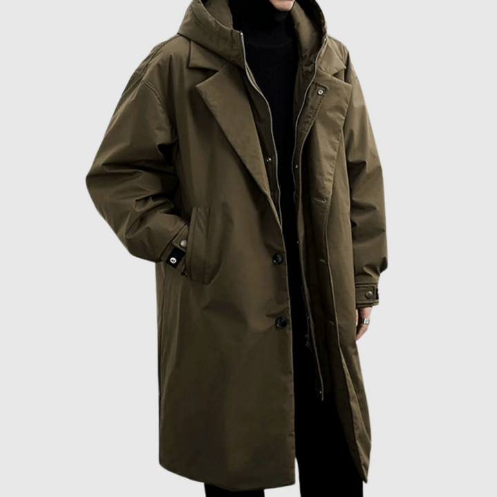 Men's lightweight waterproof raincoat with stowable hood for ultimate all-weather storm protection. Ideal outdoor gear.
