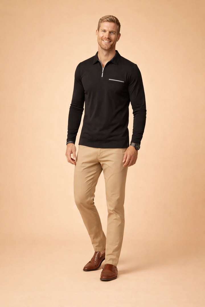 Man styling a long-sleeve quarter-zip polo shirt for a smart casual, modern men's fashion look.