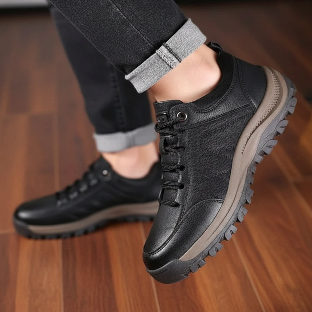 Man wearing comfortable men's orthopedic walking shoes for outdoor activities.