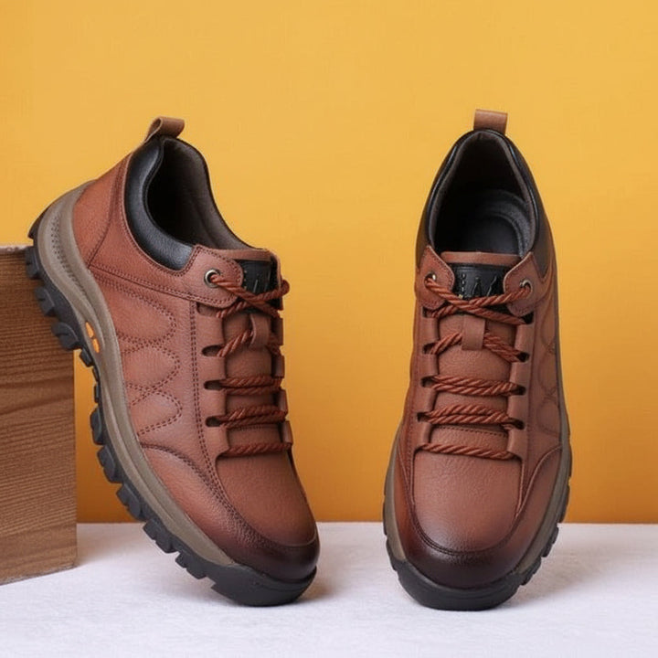 Men's arch support walking shoes in a rugged, outdoor setting.