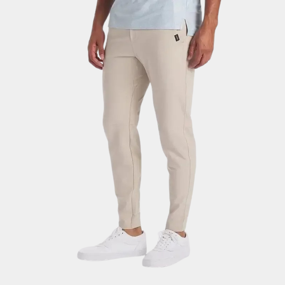 Athletic men's outdoor pants with stretch for ultimate mobility & all-weather protection on trails.