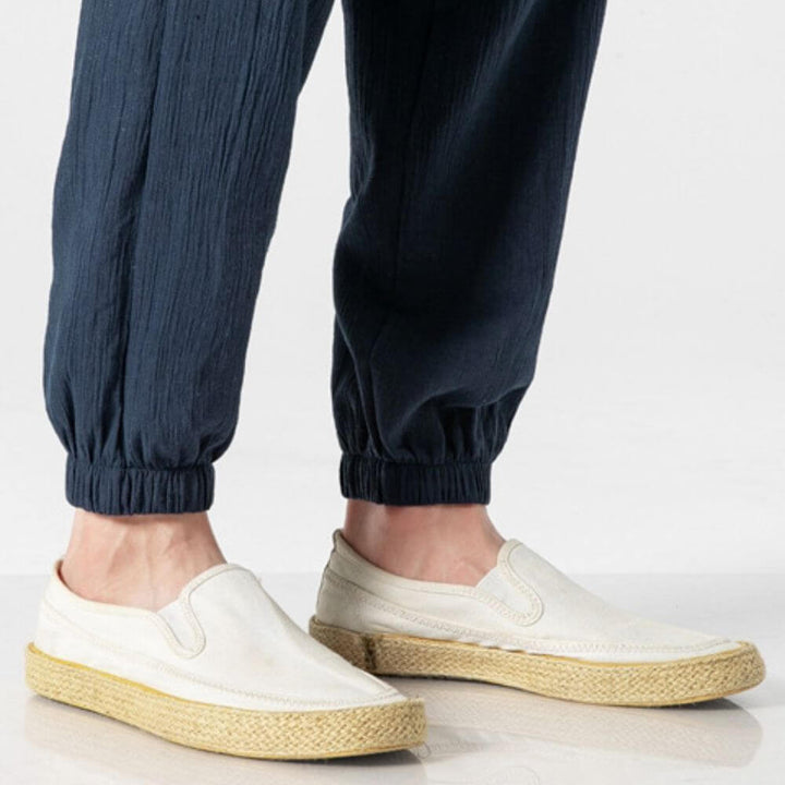 Relaxed fit men's casual pants, breathable and lightweight for spring & summer comfort.