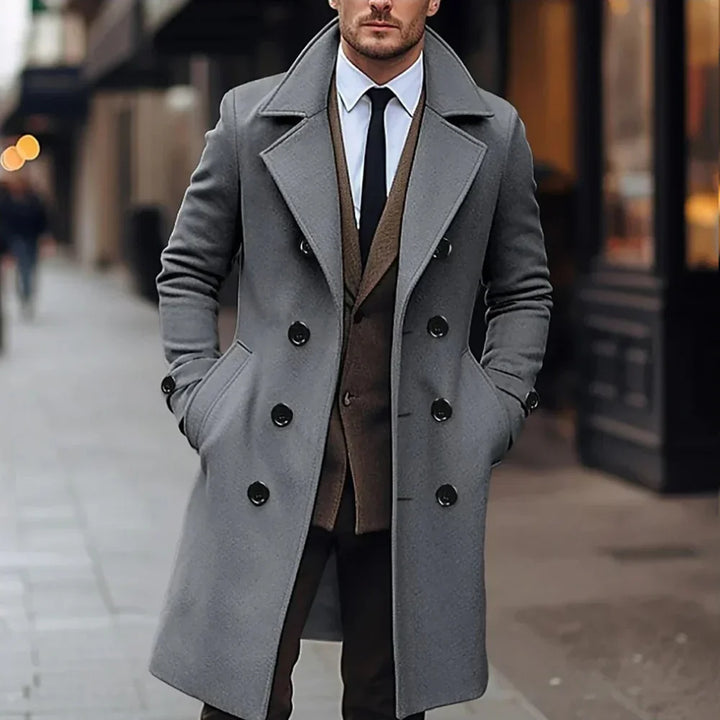 Sophisticated men's long winter coat, tailored for a classic, elegant style. Ideal for fall and winter fashion.