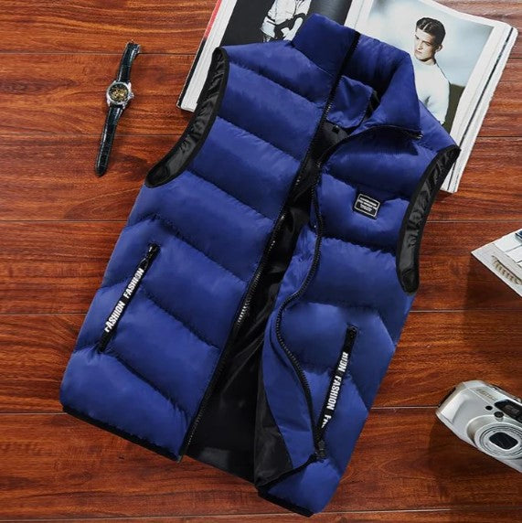 Front view of a men's lightweight zip-up puffer vest. Sleeveless design for layering & warmth.