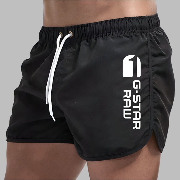 Lightweight men's swim trunks with quick-drying fabric.