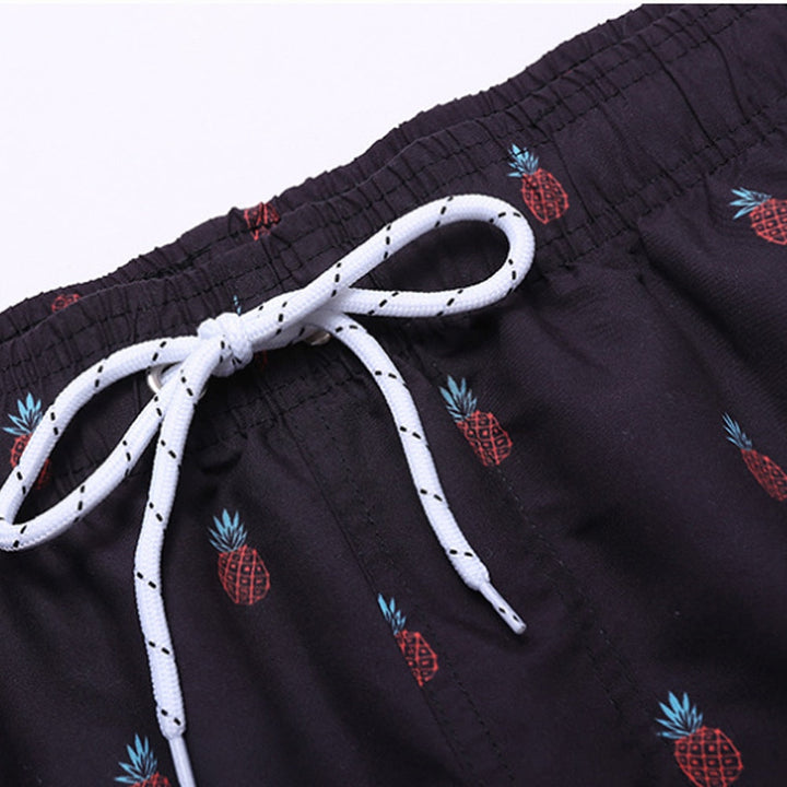 Athletic men's swim trunks designed for comfort and rapid drying by the pool.