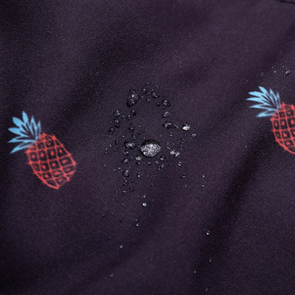Stylish mens swim shorts with a modern fit, ideal for active summer wear.
