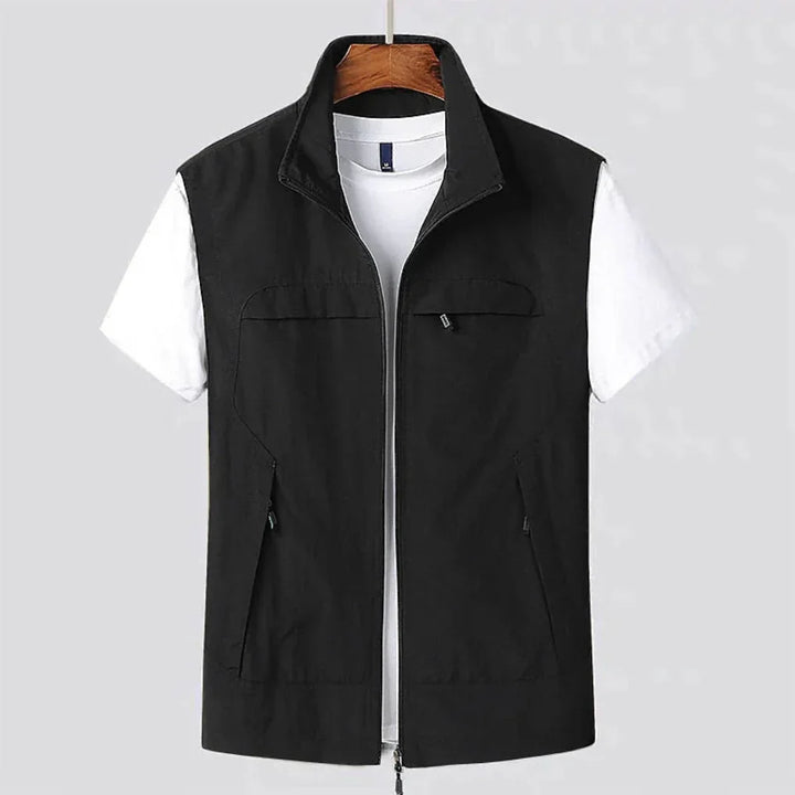 Durable men's quick-dry hiking vest with multiple pockets. Perfect sleeveless travel apparel for outdoor adventures.