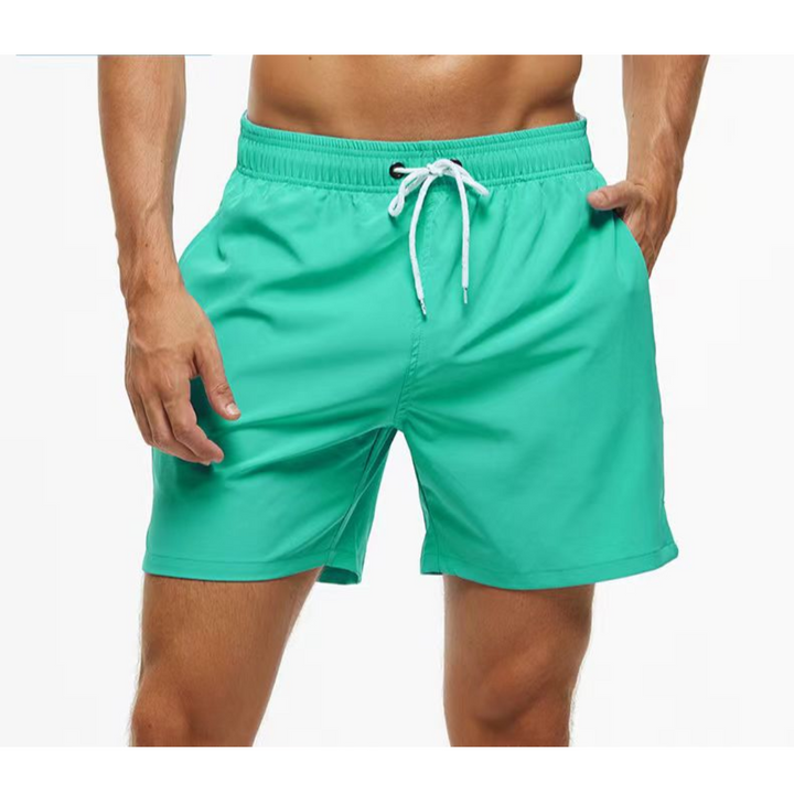 Modern men's bathing suits, quick-drying and adjustable for stylish summer comfort.
