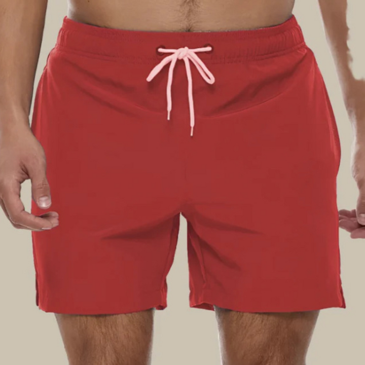 Men's quick-drying swimwear with adjustable waist, great for active poolside fashion.