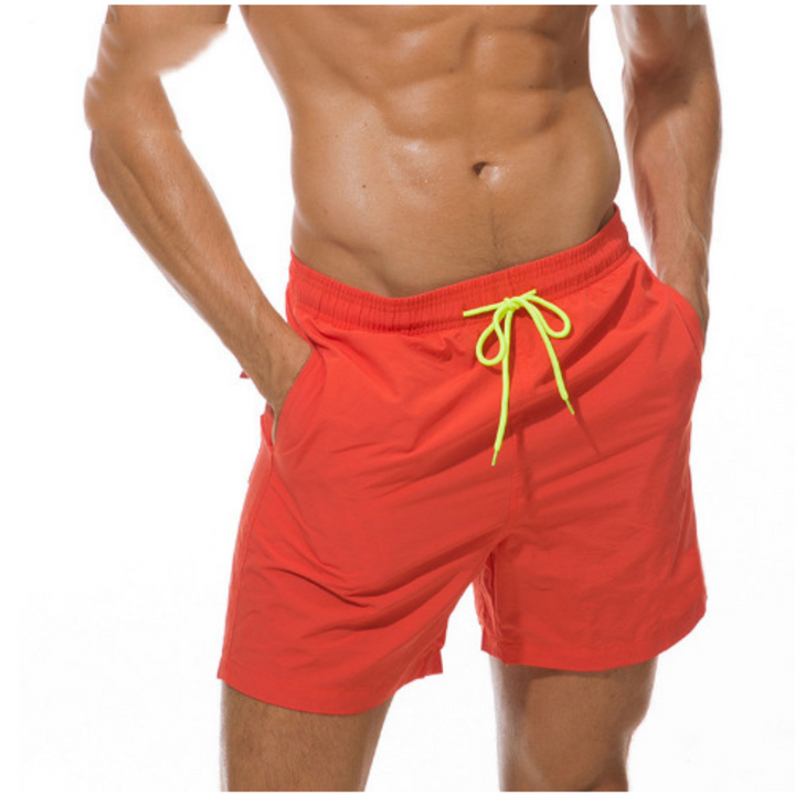 Durable men's quick-dry swim shorts, essential for water sports & poolside comfort.