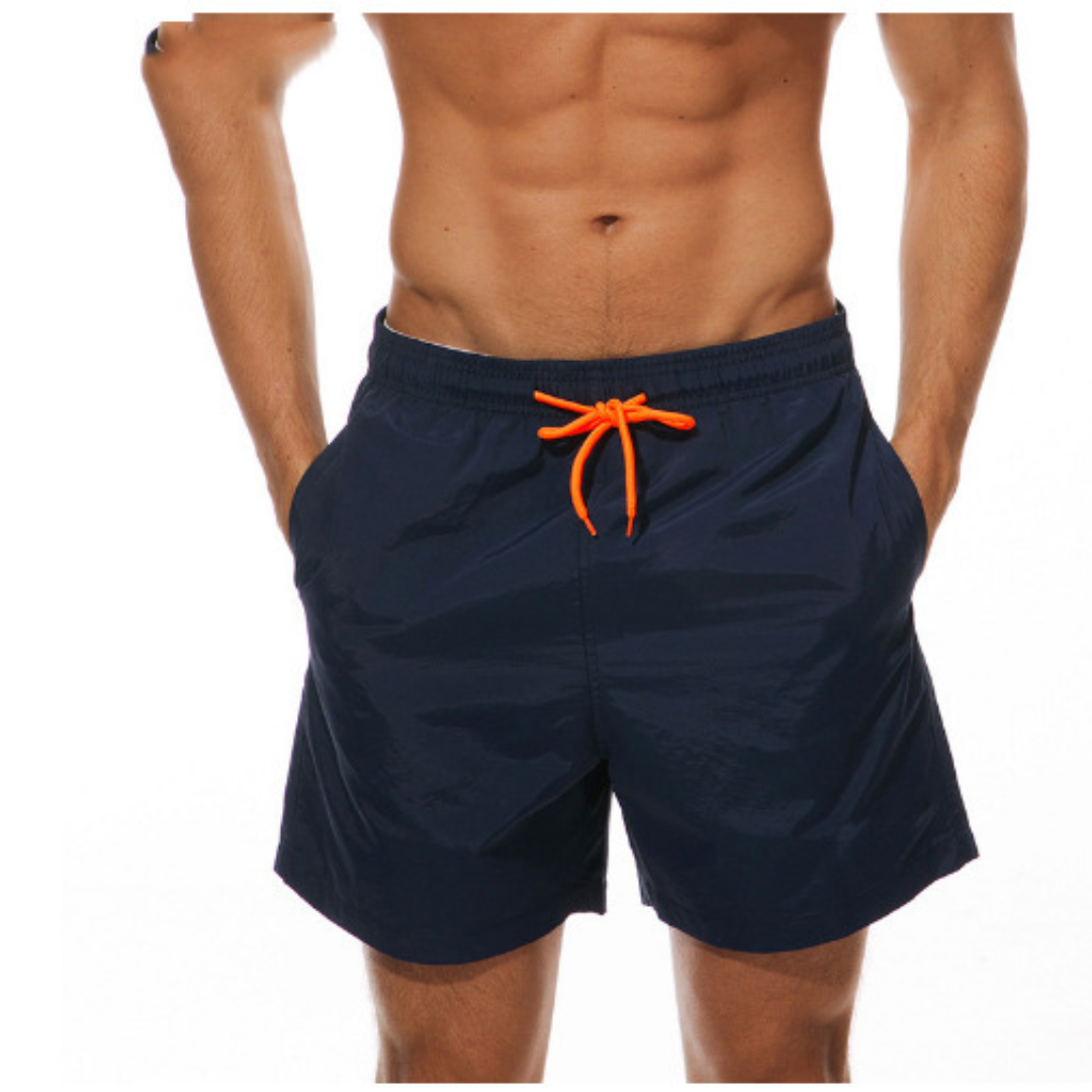 Versatile men's summer trunks with adjustable waist for beach and casual wear.