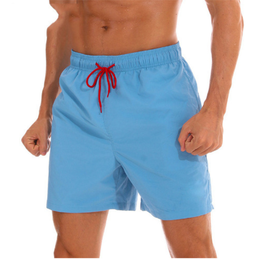 Lightweight men's swim shorts, quick-dry fabric, ideal for vacation essentials.