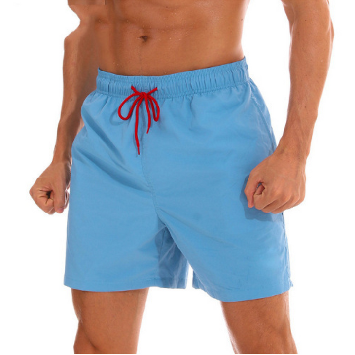 Lightweight men's swim shorts, quick-dry fabric, ideal for vacation essentials.