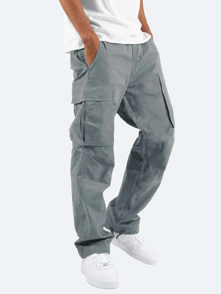 Stylish men's relaxed fit utility pants, featuring multiple practical pockets for casual fashion & comfort.