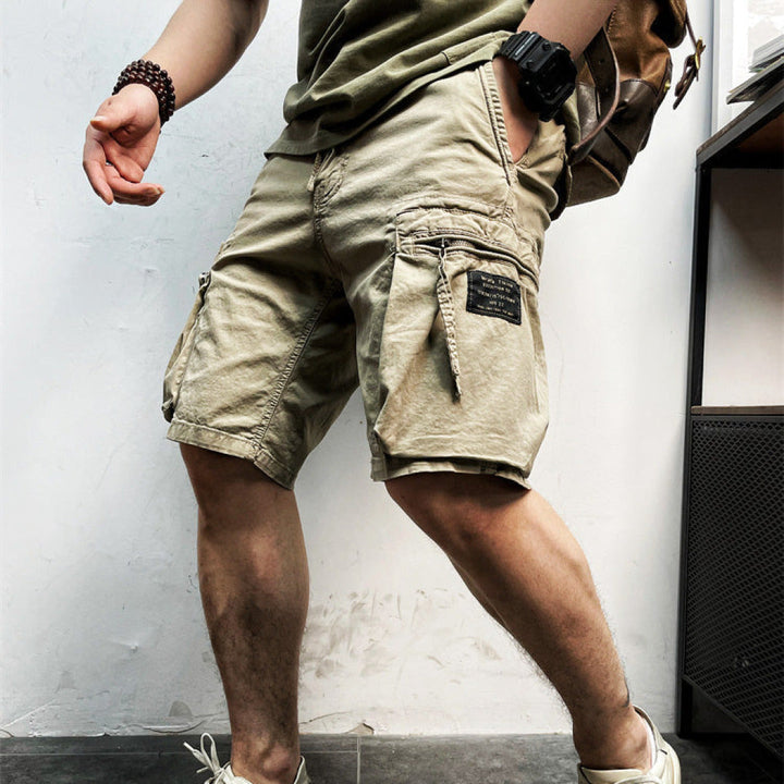 Comfortable men's relaxed fit cargo shorts for casual wear. Multi-pocket, knee-length utility shorts with adjustable waist.