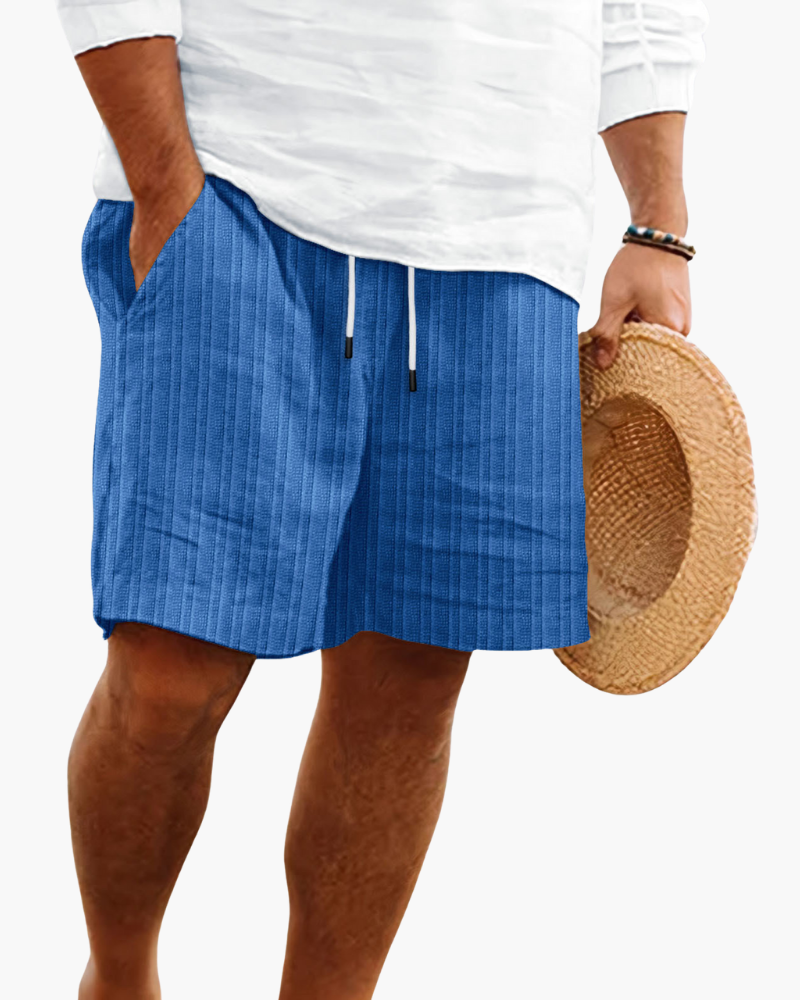 Men's relaxed fit drawstring shorts in blue, ideal for casual summer comfort and everyday wear.