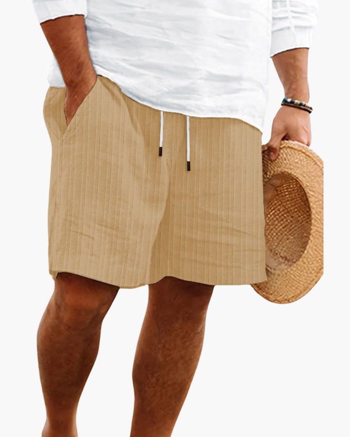 Close-up of men's relaxed fit casual shorts fabric, showcasing lightweight and comfortable design.