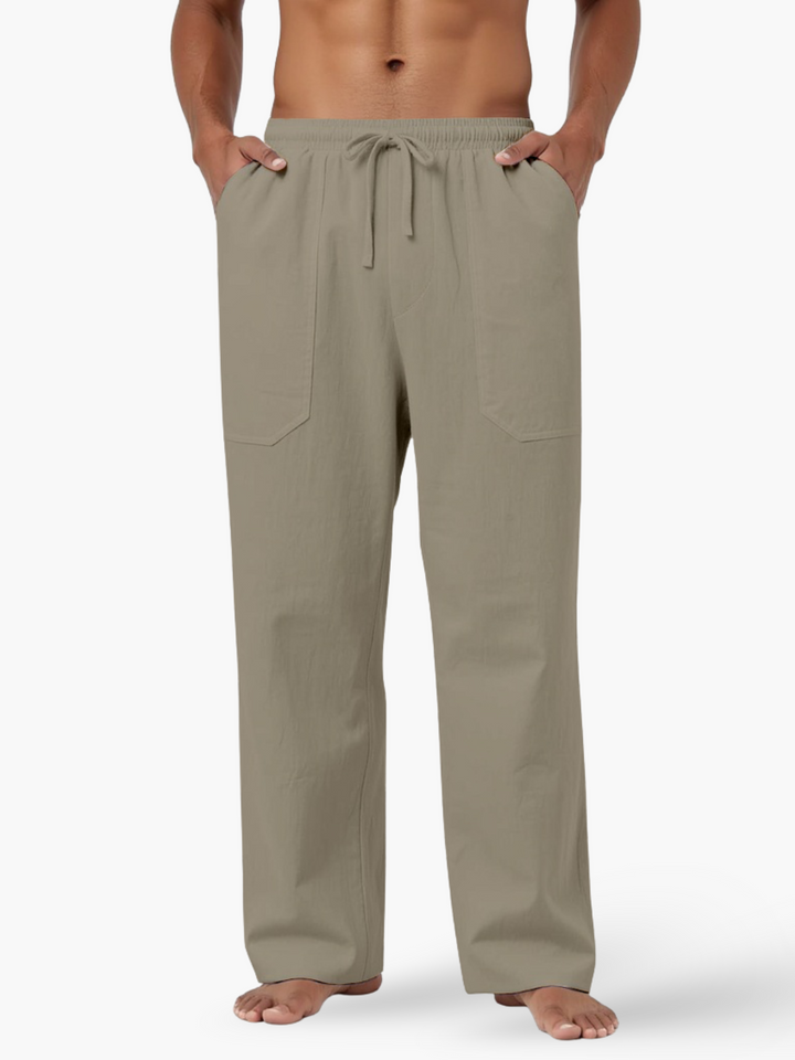 Men's relaxed fit pants crafted from a soft and breathable linen blend.