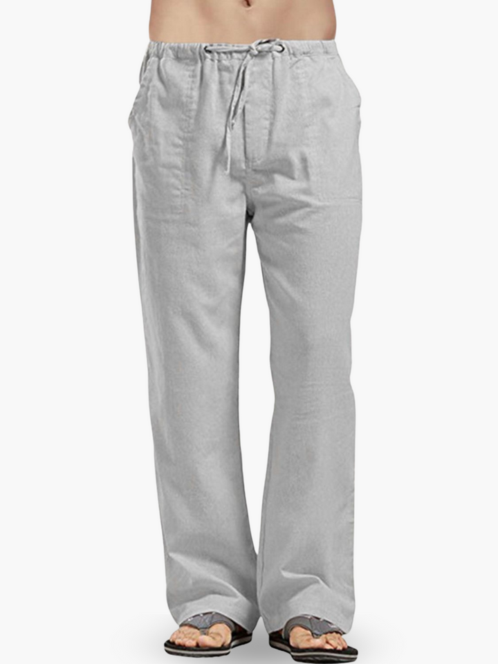 Plus size men's relaxed fit pants with a drawstring, offering all-day comfort in a linen blend.