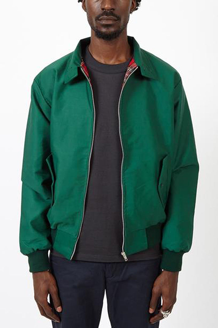 Full-body shot of a man in a classic style men's Harrington jacket
