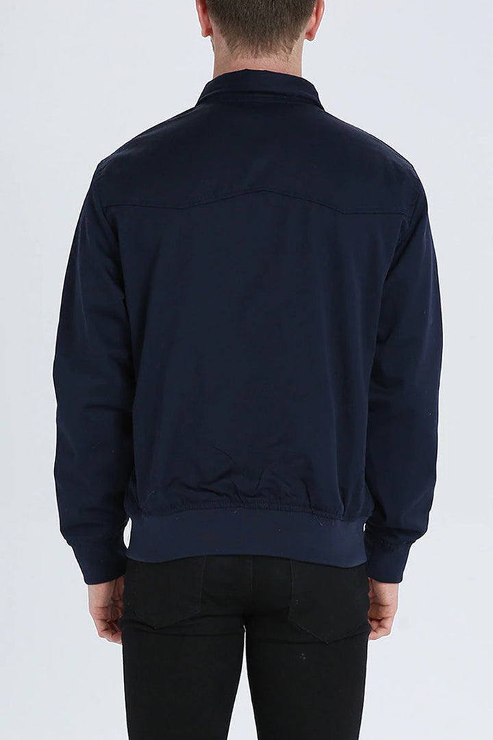Close-up of the ribbed cuffs and hem on a men's Harrington jacket
