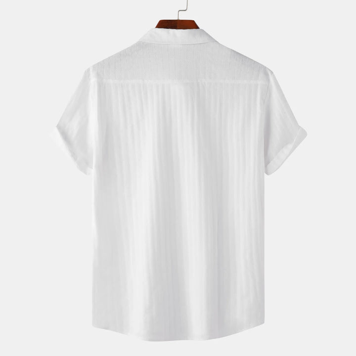 Menswear short sleeve dress shirt in a versatile hue