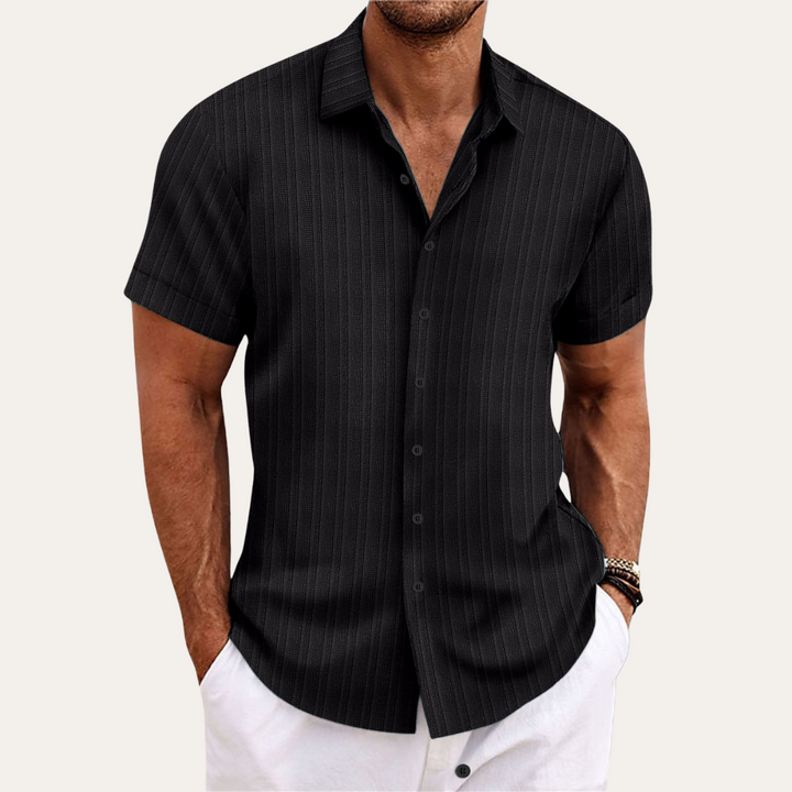 Regular fit men's striped short sleeve button-down shirt for a comfortable & versatile casual look.