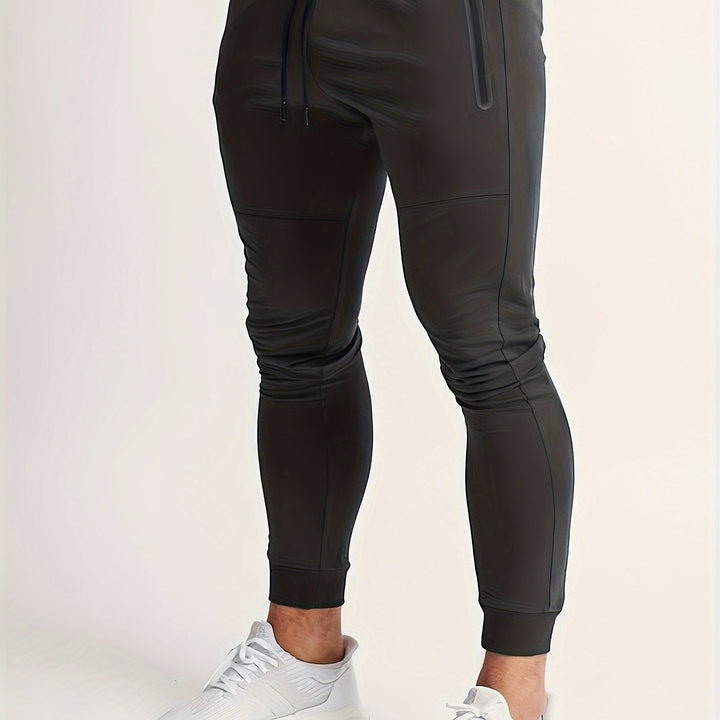 Man wearing comfortable slim fit joggers for everyday activewear.