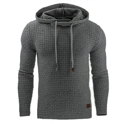Close-up of the textured knit fabric on a men's slim fit hoodie.