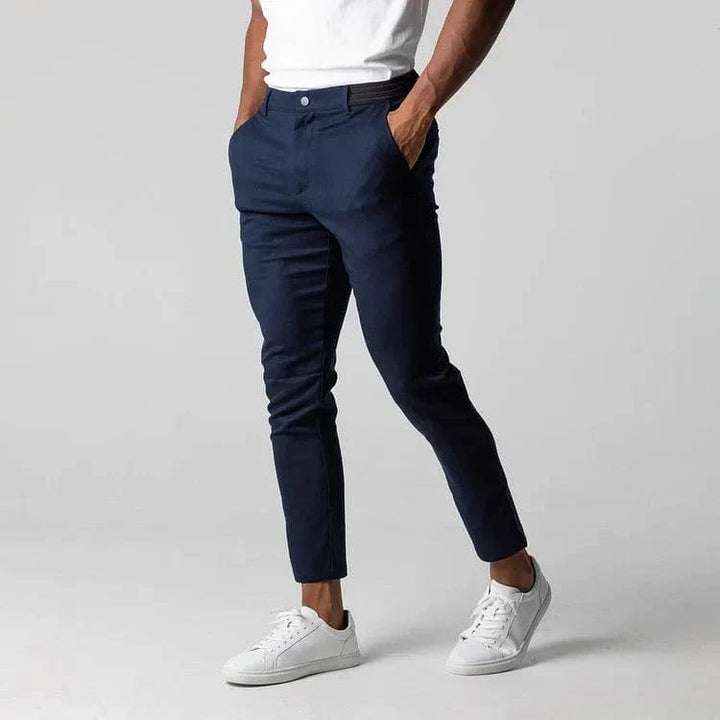 Men's slim fit stretch chinos in classic khaki, offering comfort and style.