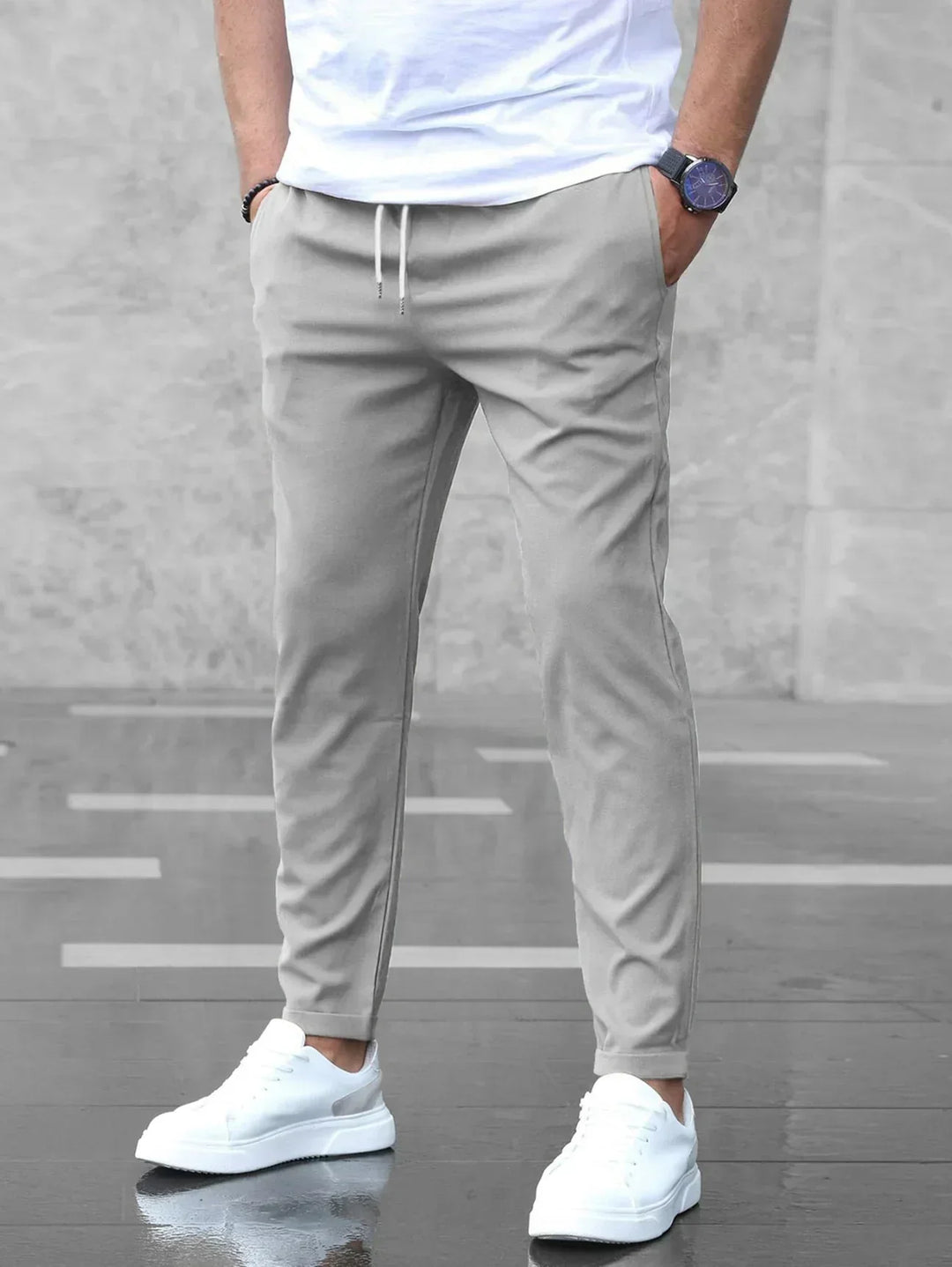 Men's slim-fit stretch trousers for modern style & comfort, ideal for everyday wear.