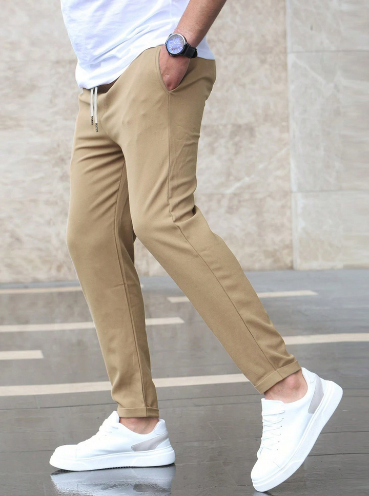 Stylish men's slim-fit stretch trousers for a contemporary look and all-day comfort.
