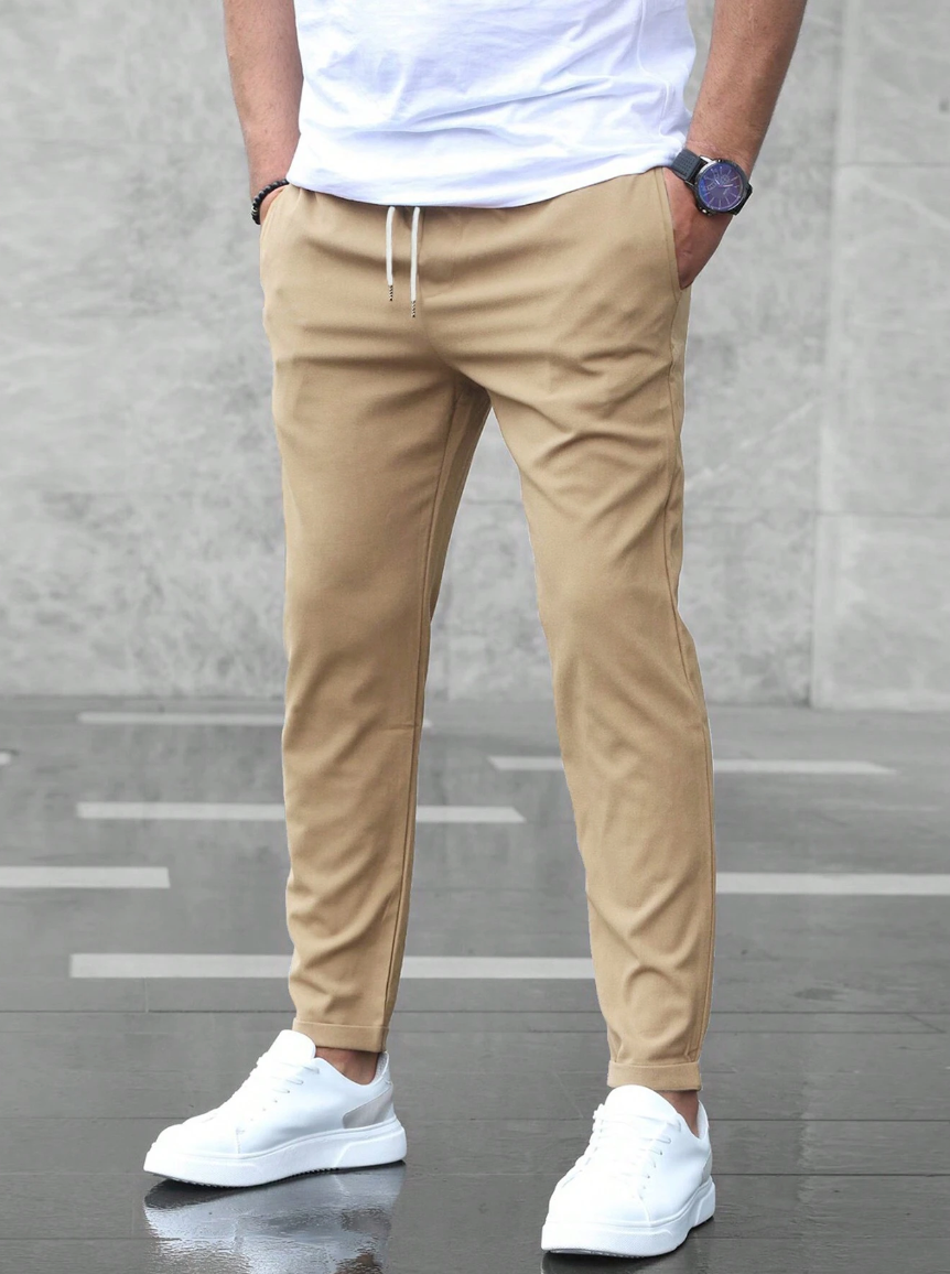 Men's stretch casual pants, slim-fit design for versatile work and everyday comfort.