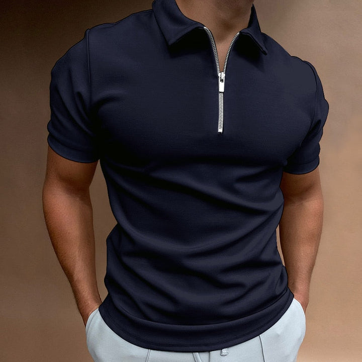 Close-up of a men's slim fit polo shirt, highlighting the modern zip collar and quality fabric.