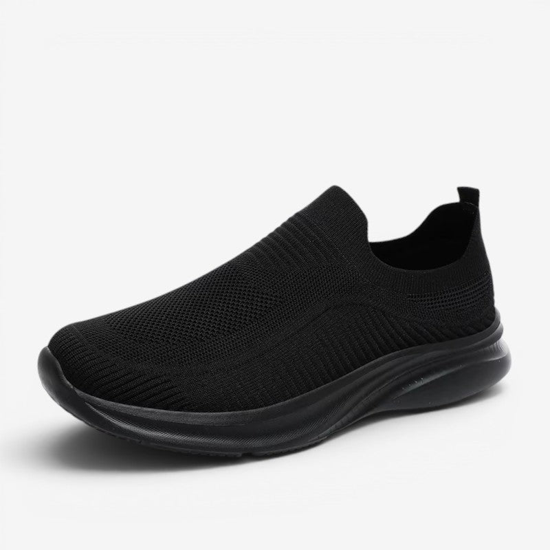 Close-up of men's casual slip-on sneakers, ideal for comfortable walking & everyday wear.
