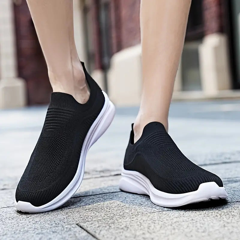 Pair of men's easy-wear slip-on sneakers, designed for ultimate comfort and casual style.