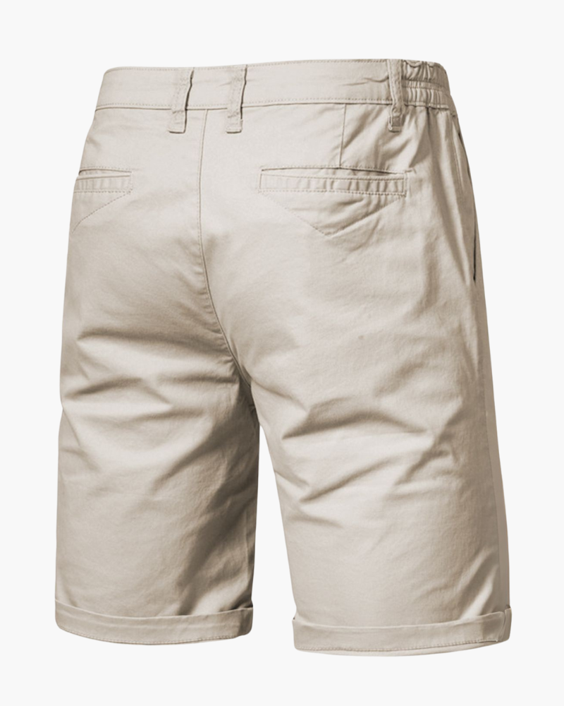 Model wearing comfortable men's chino shorts for a smart casual look.