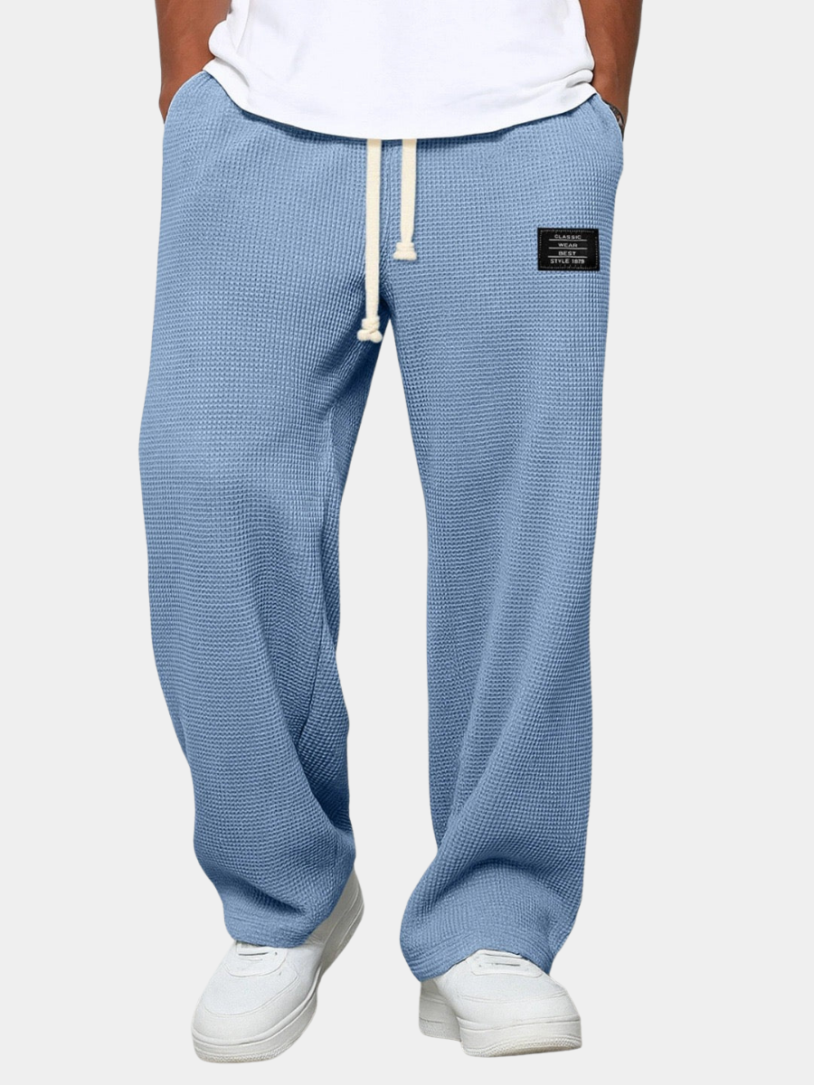 Soft feel men's sweatpants, ideal for lounging or activewear. Comfortable casual pants.