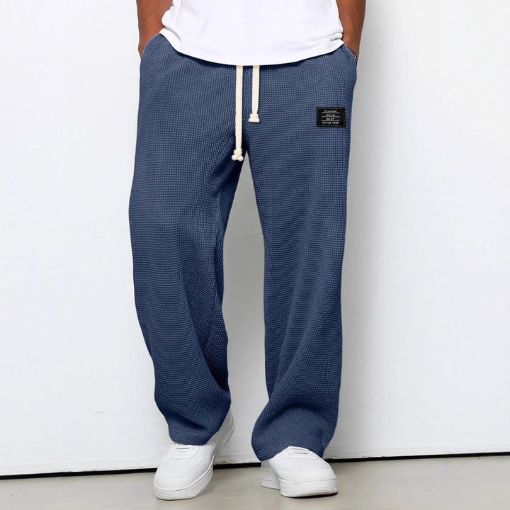 Versatile men's jogging pants. Soft feel, perfect for activewear, gym, or casual lounge comfort.