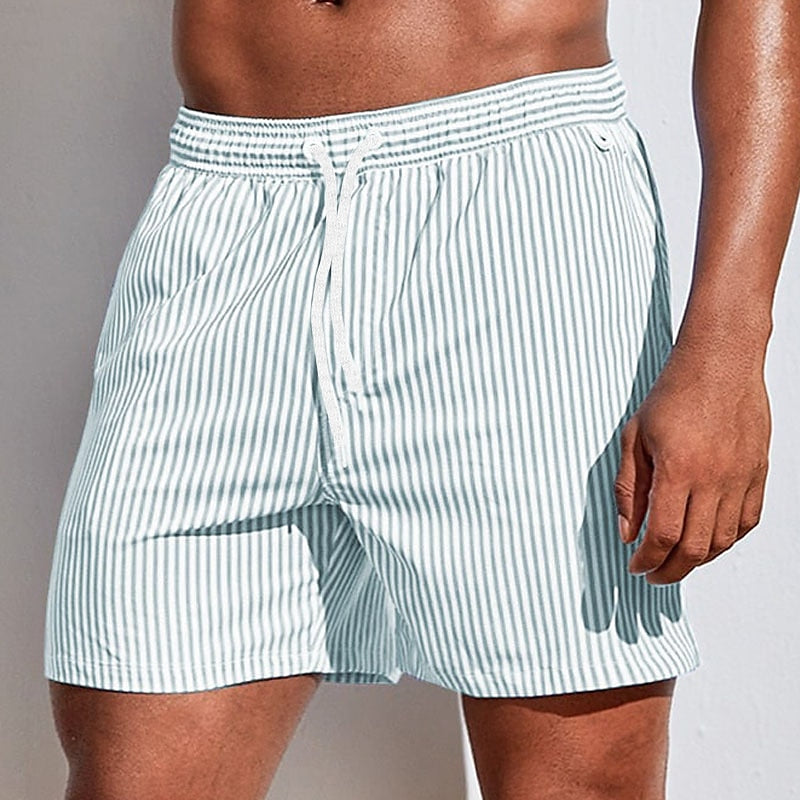 Stylish men's beachwear: striped drawstring swim shorts.