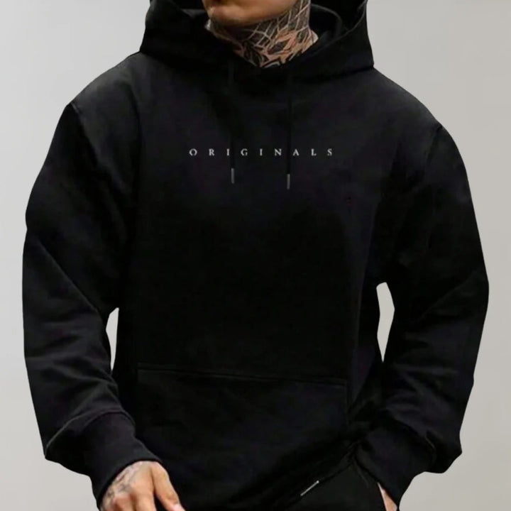 Versatile men's oversized hooded sweatshirt, a stylish pullover for modern casual wear & men's fashion.