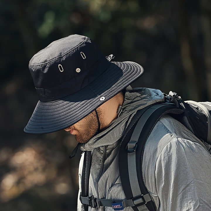 Stylish men's outdoor sun hat with wide brim, offering essential UV protection for beach & walking.