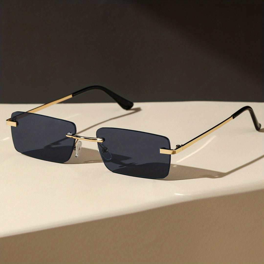 Close-up of men's frameless sunglasses, highlighting lightweight design, protective lenses, and modern aesthetic.