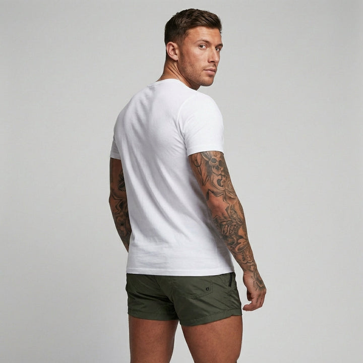 High-performance men's quick-dry swim shorts, durable with secure zipper pockets for all adventures.