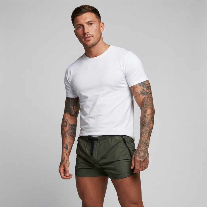 Premium men's quick-dry swim shorts with secure zipper pockets, essential beachwear for summer.