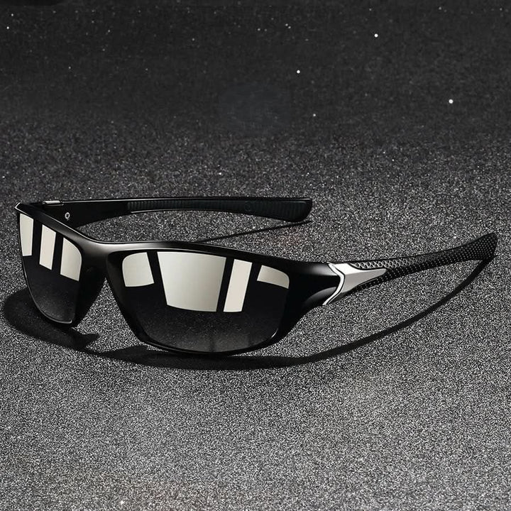 Secure-fit men's sports sunglasses. Polarized UV400 lenses, lightweight frame, and comfortable rubberized temples.